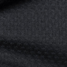 Charger l'image dans la galerie, Tissu en maille noire avec motifs en relief. 100% coton biologique certifié GOTS. Disponible en noir et en orange.